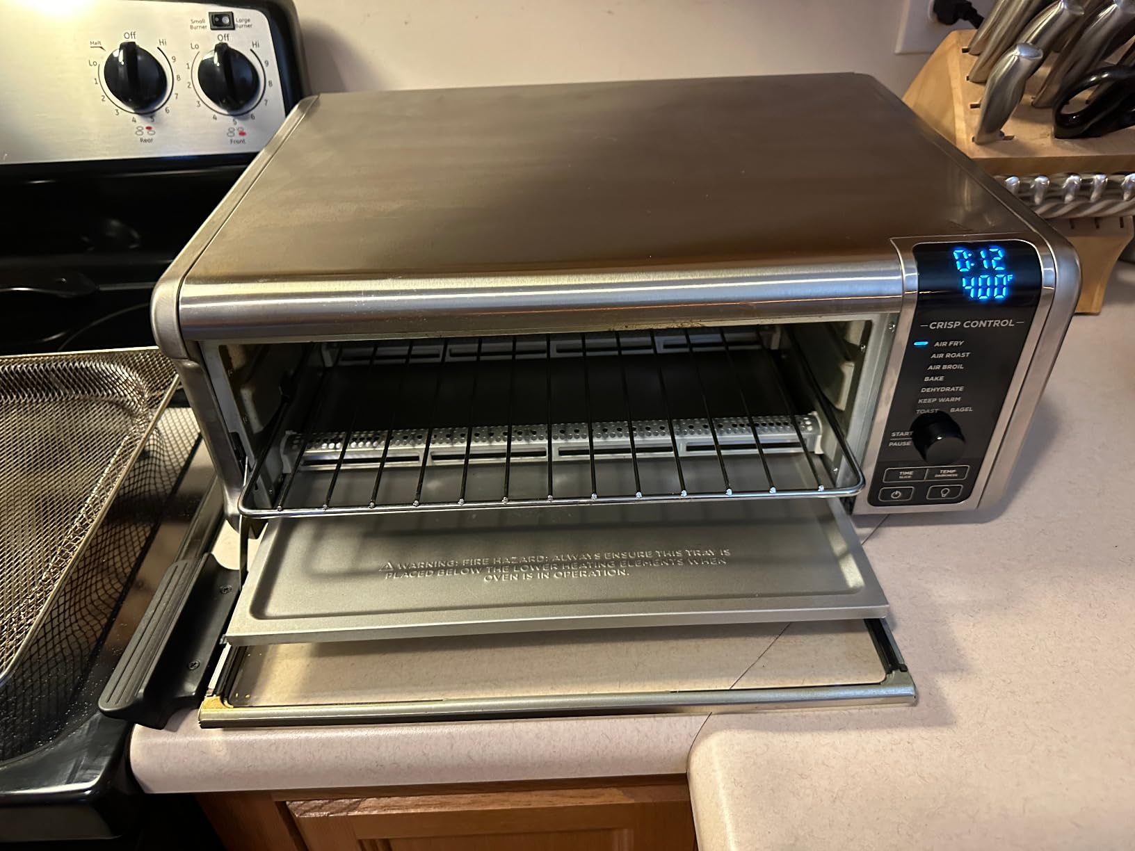 Ninja Air Fryer Toaster Oven Combo | 8-in-1 Functionality | Flip Up & Away for Storage Space | Air Fry Basket, Sheet Pan, Wire Rack & Removable Crumb Tray |1800 Watt | Stainless Steel | SP151 customer photo 2
