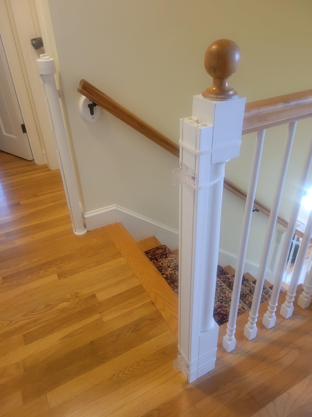 Retract-A-Gate 52 Inch White Retractable Baby and Dog Gate, Made in USA | The original certified retractable gate for top & bottom stairs; 200lb push-out force, angled installs, wide, tall, & sleek customer photo 1