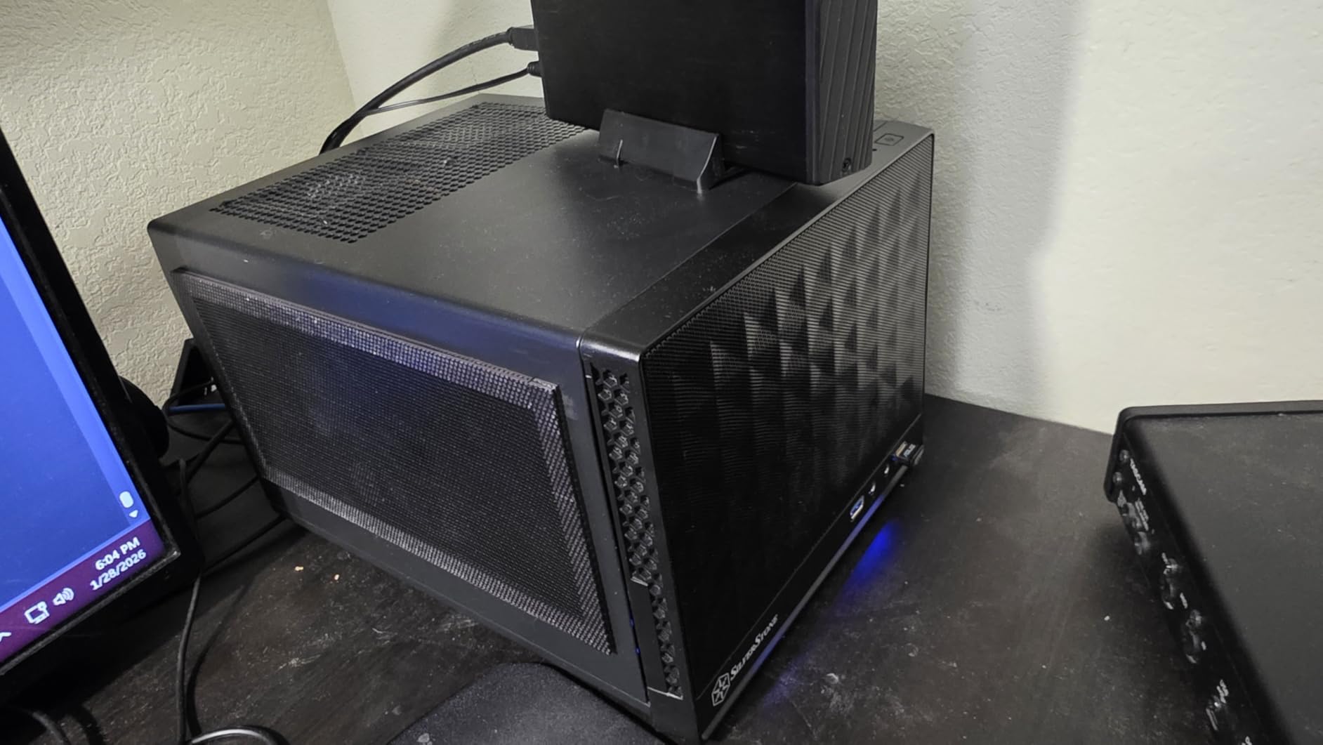 SilverStone Technology Ultra Compact Mini-ITX Computer Case with Mesh Front Panel Black (SST-SG13B-USA) customer photo 1