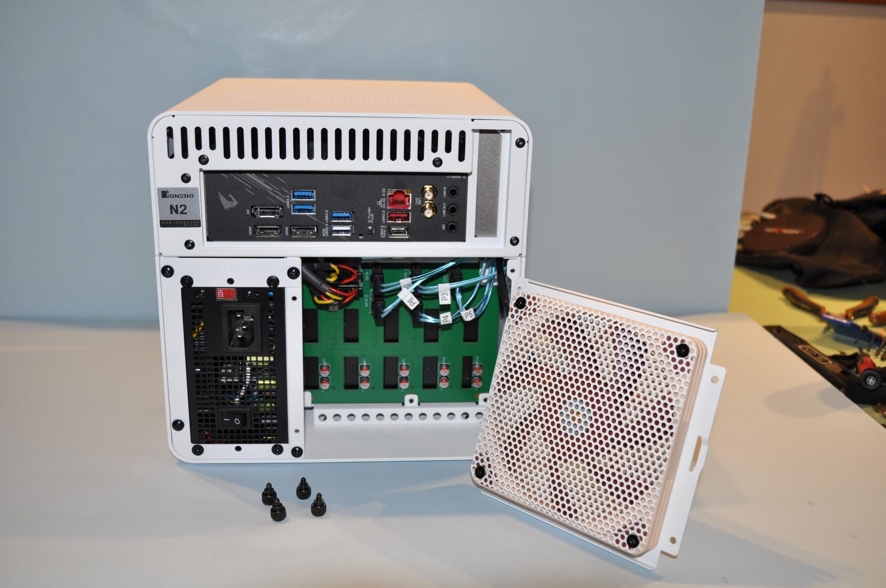 JONSBO N2 Black NAS ITX Case 5+1 Disk Bays Mini Aluminum Case, Built-in 12cm Fan, SFX Power Bite (L150mm Max.), Support 65mm CPU Cooler, Integrated Upper Cover Removable, Black customer photo 1