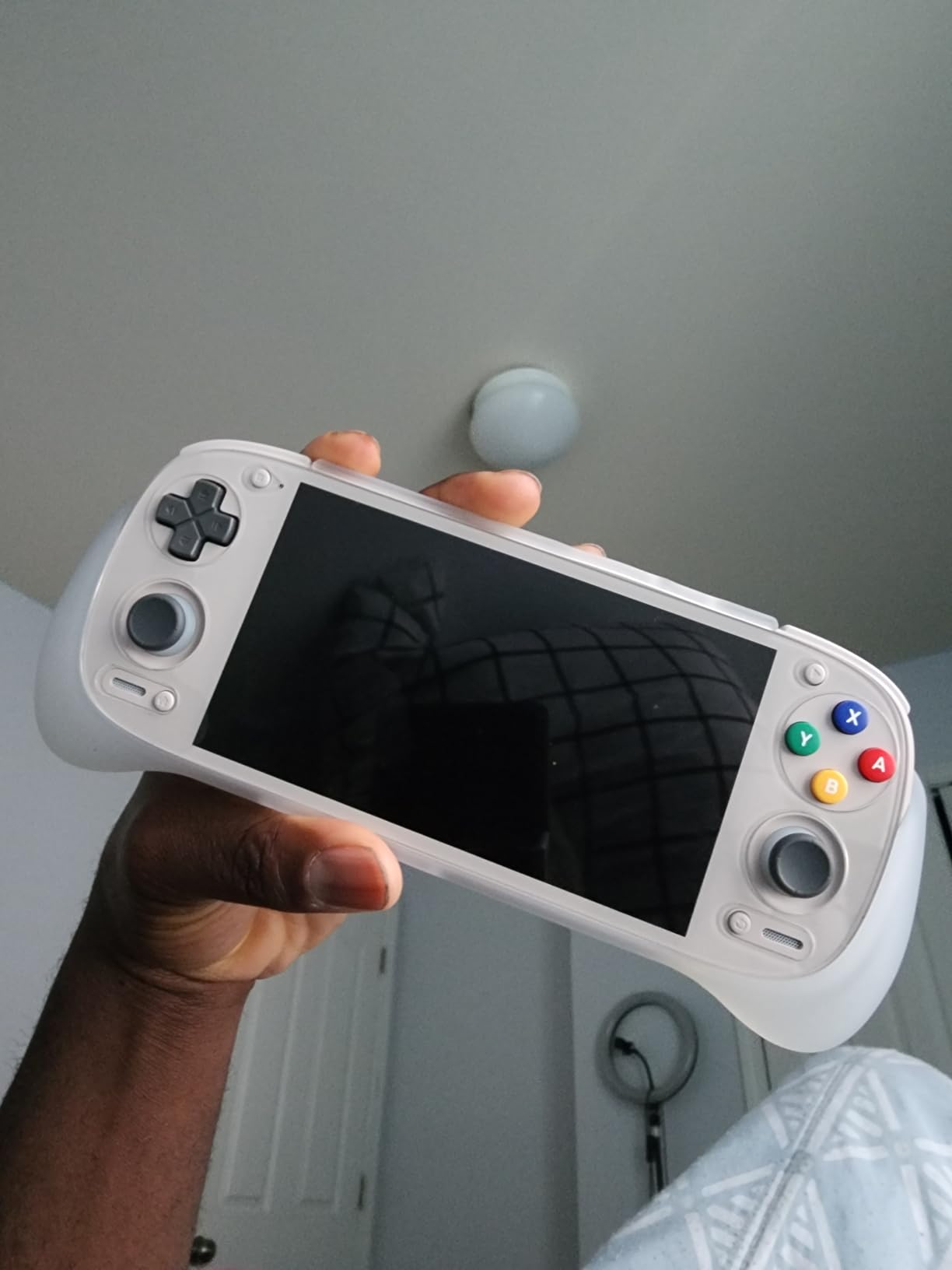 Retroid Pocket 5 Retro Handheld Game Console, 8+128G, 5.5-inch touchscreen 1080p Portable Android Gaming Handheld with Adreno 650 GPU & WiFi 6/BT5.1, Snapdragon 865 Processor, Android 13 (16Bit) customer photo 1