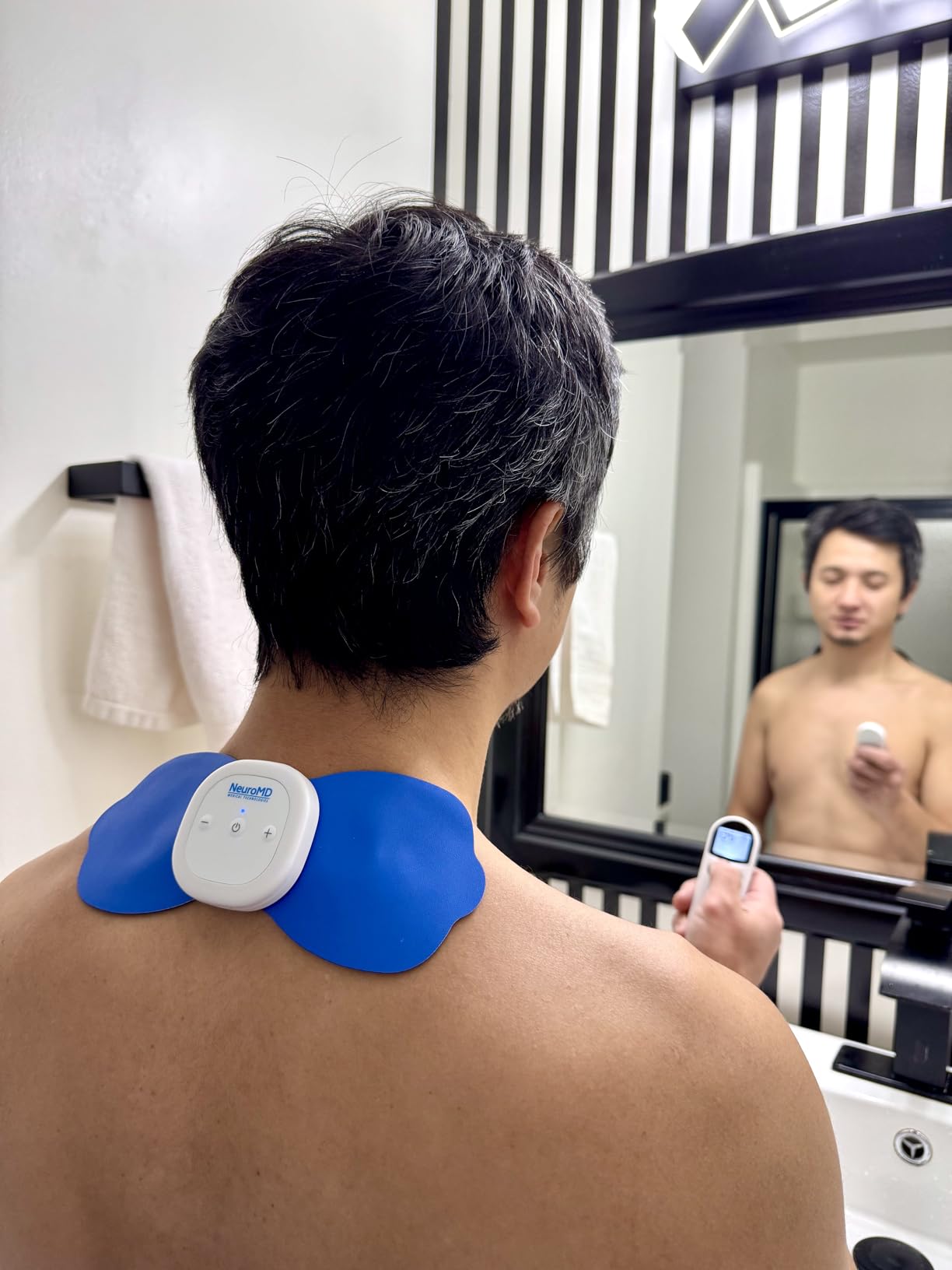 NeuroMD NMES Wireless Muscle Stimulator - Portable Device for Temporary Relief of Pain Due to Sore/Aching Muscles, Model SM9113 customer photo 1