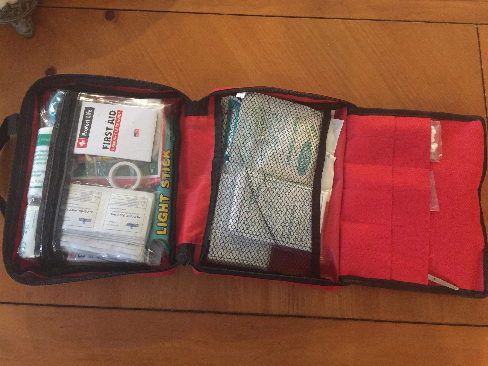 Protect Life Travel First Aid Kit for Car - Small Mini Emergency Kit, 100 Piece Waterproof First Aid Kit for Home, Camping, Boat & Hiking - Includes Emergency Blanket & First Aid Guide customer photo 1