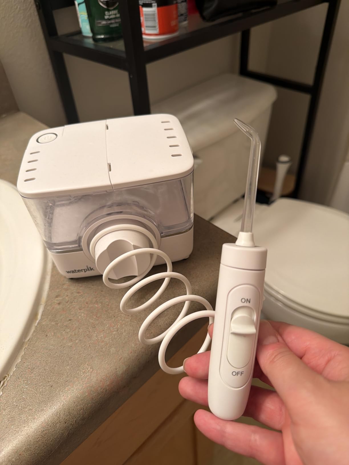 Waterpik ION Rechargeable Water Flosser with 10 Settings, 7 Tips, White customer photo 1