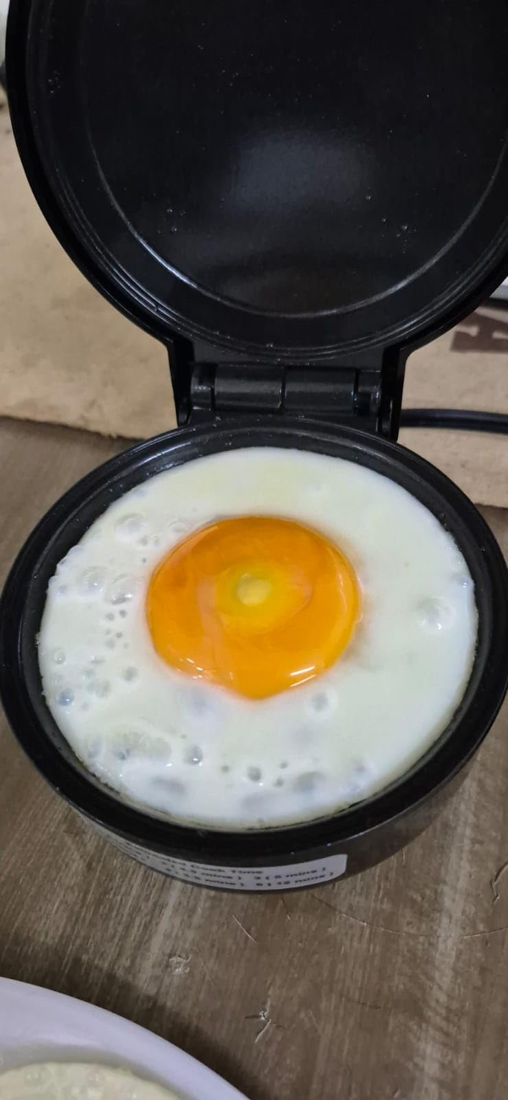 Hyvance Smart Fried Egg Cooker, Automatic Fried Egg Maker for 6 Features like Sunny Side Up, Over Easy, Fully Cooked & More. Auto Power Off, Alarm, Round Shape, Non Stick Coating (Black) customer photo 2